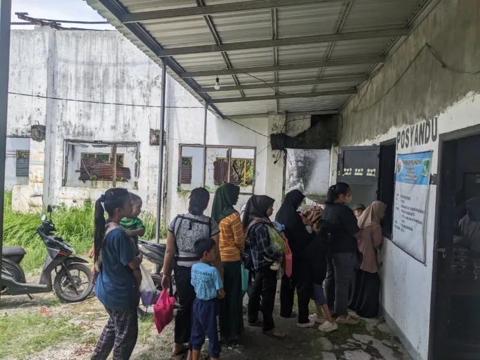 MBG Perdana Dibagikan di Posyandu Kejapanan Pasuruan, 151 Ibu Menyusui Terima Paket Gizi